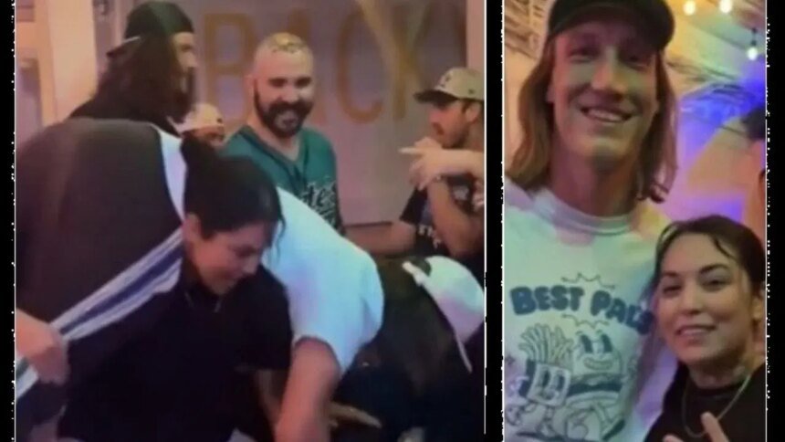 Trevor Lawrence permite a una aficionada levantarlo y hacer sentadillas